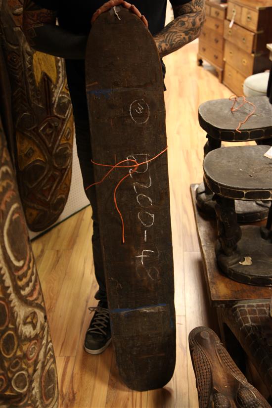 Sepik River carved wooden gope board and two other boards